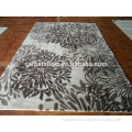 Modern hand tufted custom carved floral pattern wool rug